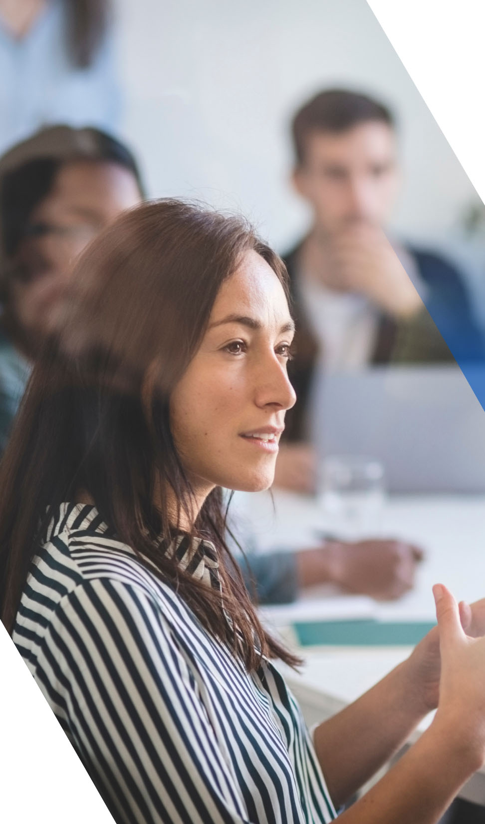 A woman sharing ideas during a work meeting