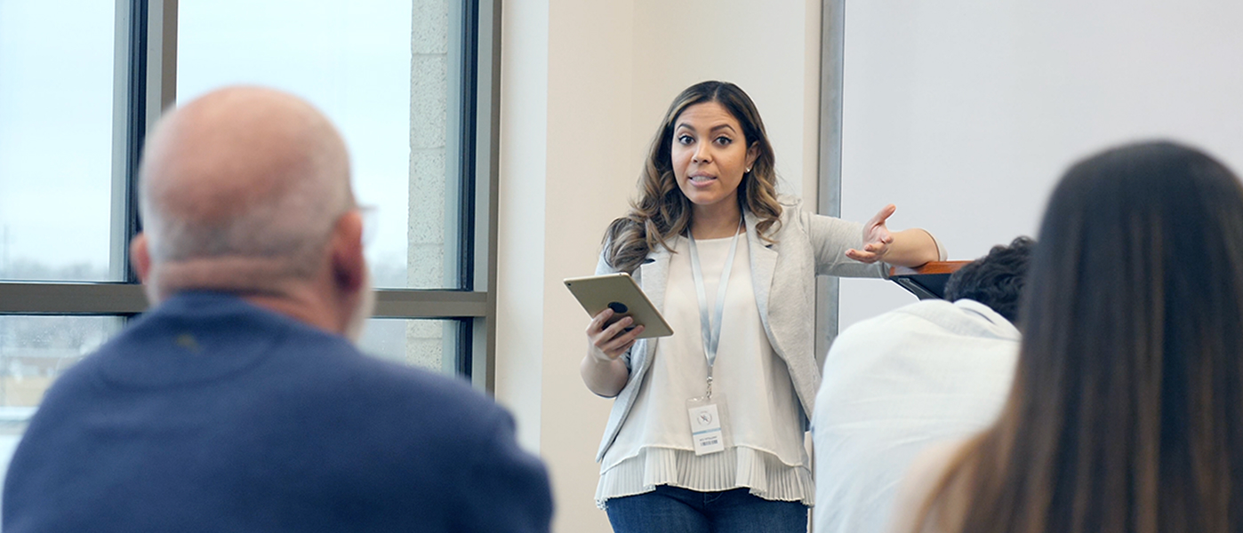 A woman giving a presentation