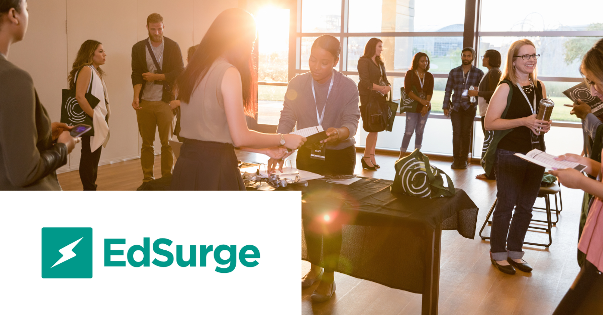 Image with the EdSurge logo on the left. The photo is from a conference registration desk.