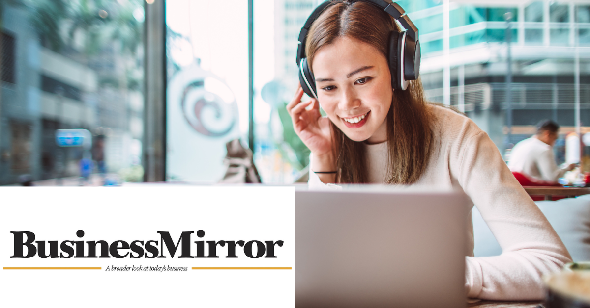 Business Mirror logo on the bottom left. Image of woman smiling at her laptop