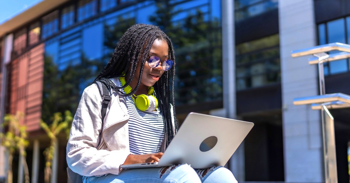 A student using her laptop