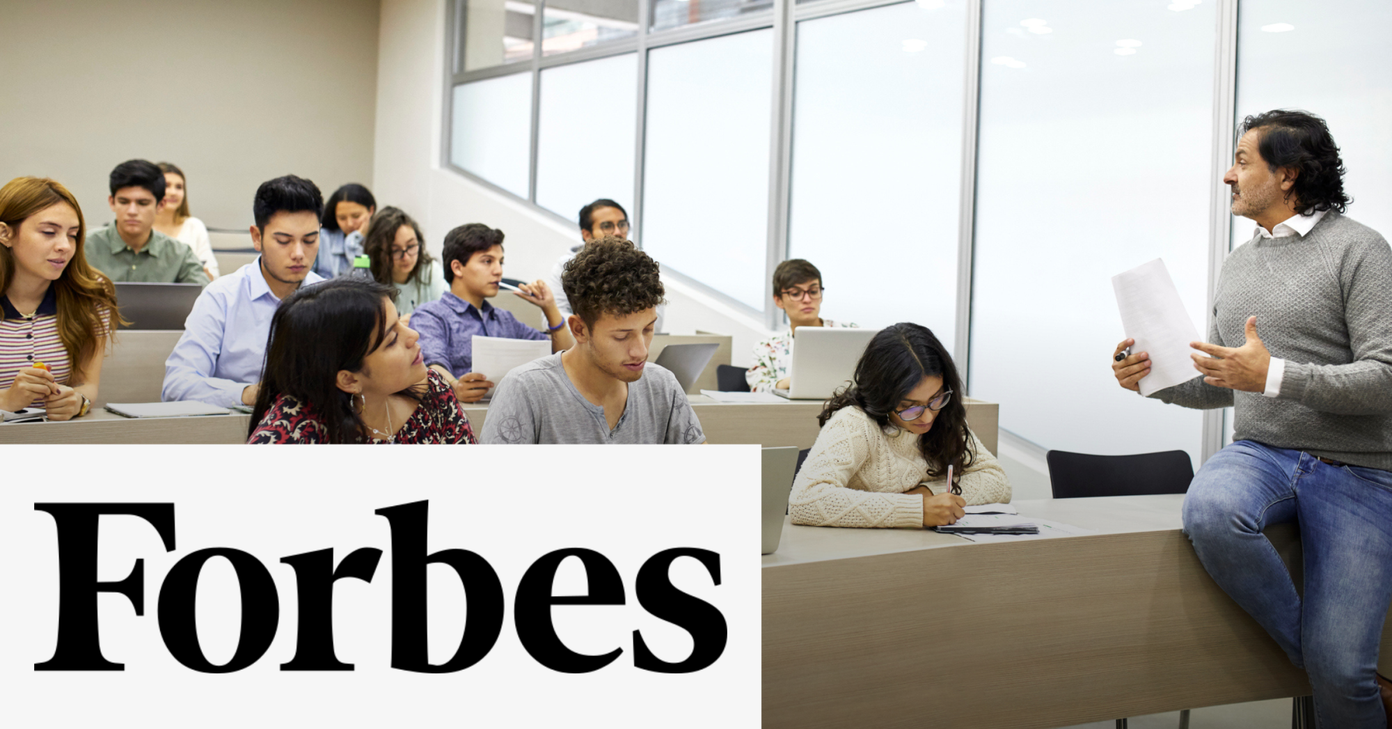 Image of a group of students with a teacher in a classroom, and a teacher with the Forbes logo placed on the left lower corner.