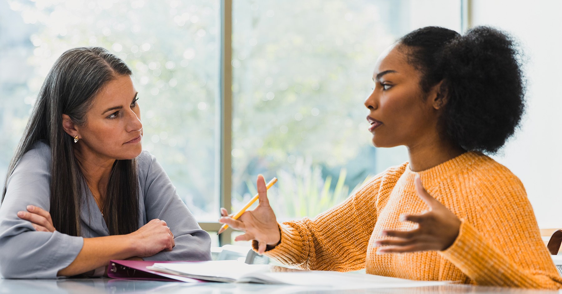 Two coworkers having a discussion