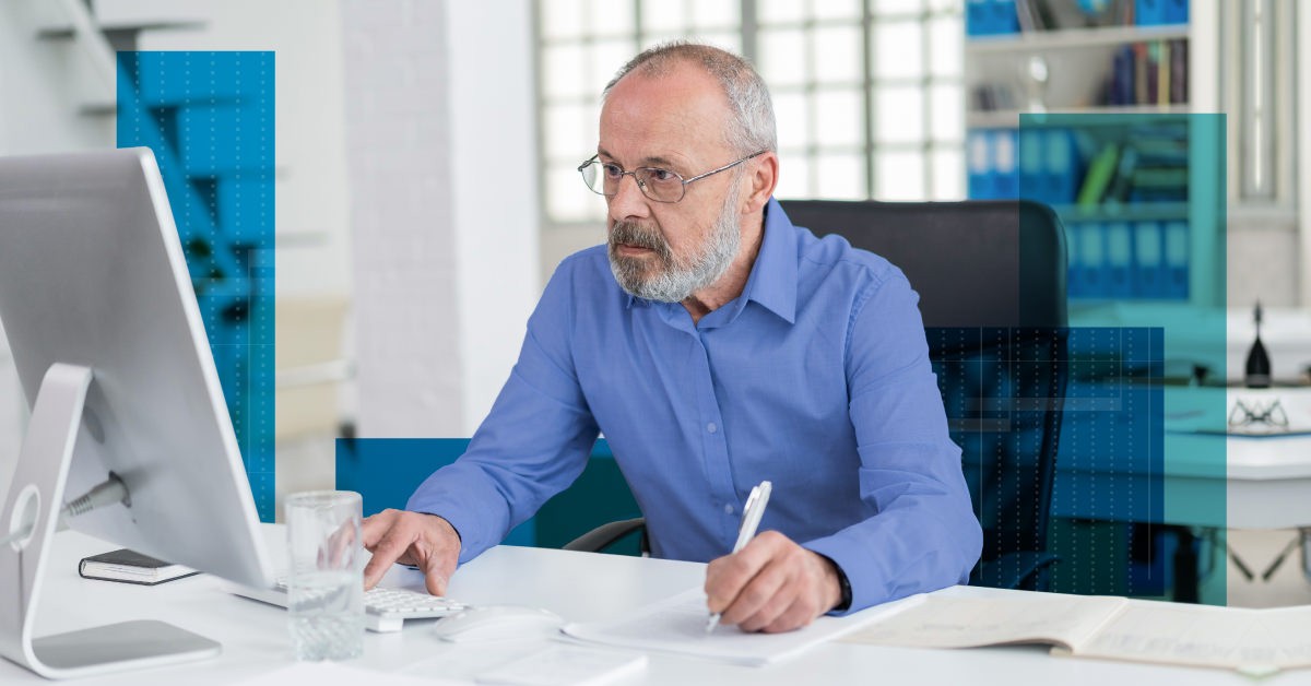 Photo of a person working at their computer